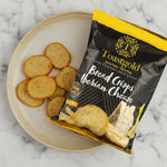 Toastgold Bread Crisps Iberian Cheese package with crackers on a plate