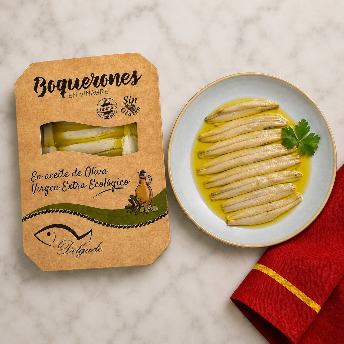 Packaged product of Boquerones en vinagre with a plate of dish on a marble surface
