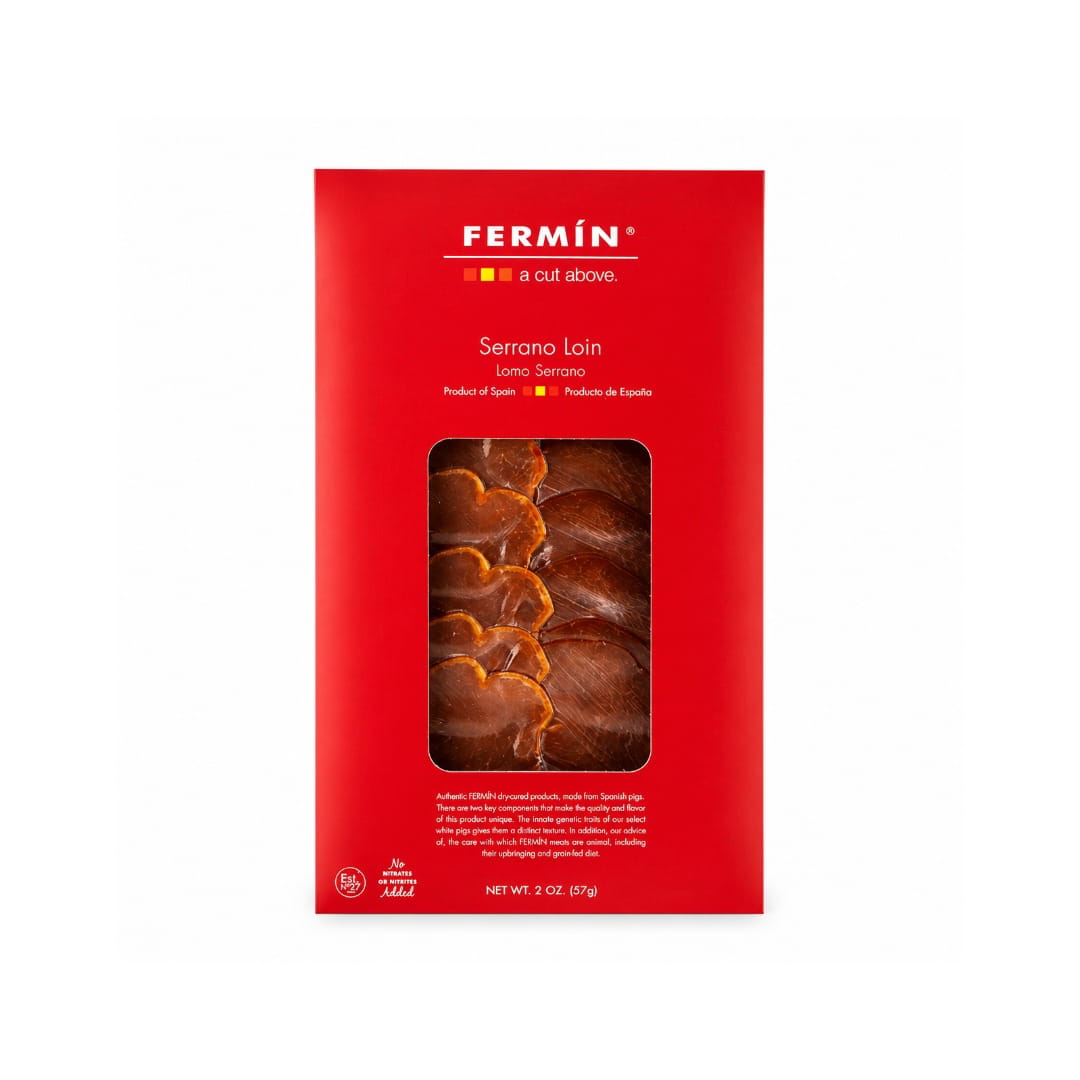 A red package of Fermin Serrano Loin beef jerky, featuring a clear window that displays the sliced, marbled jerky inside. The brand name 'FERMIN' is printed in white at the top, and the product is shown against a clean white background.