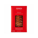 A red package of Fermin Serrano Loin beef jerky, featuring a clear window that displays the sliced, marbled jerky inside. The brand name 'FERMIN' is printed in white at the top, and the product is shown against a clean white background.