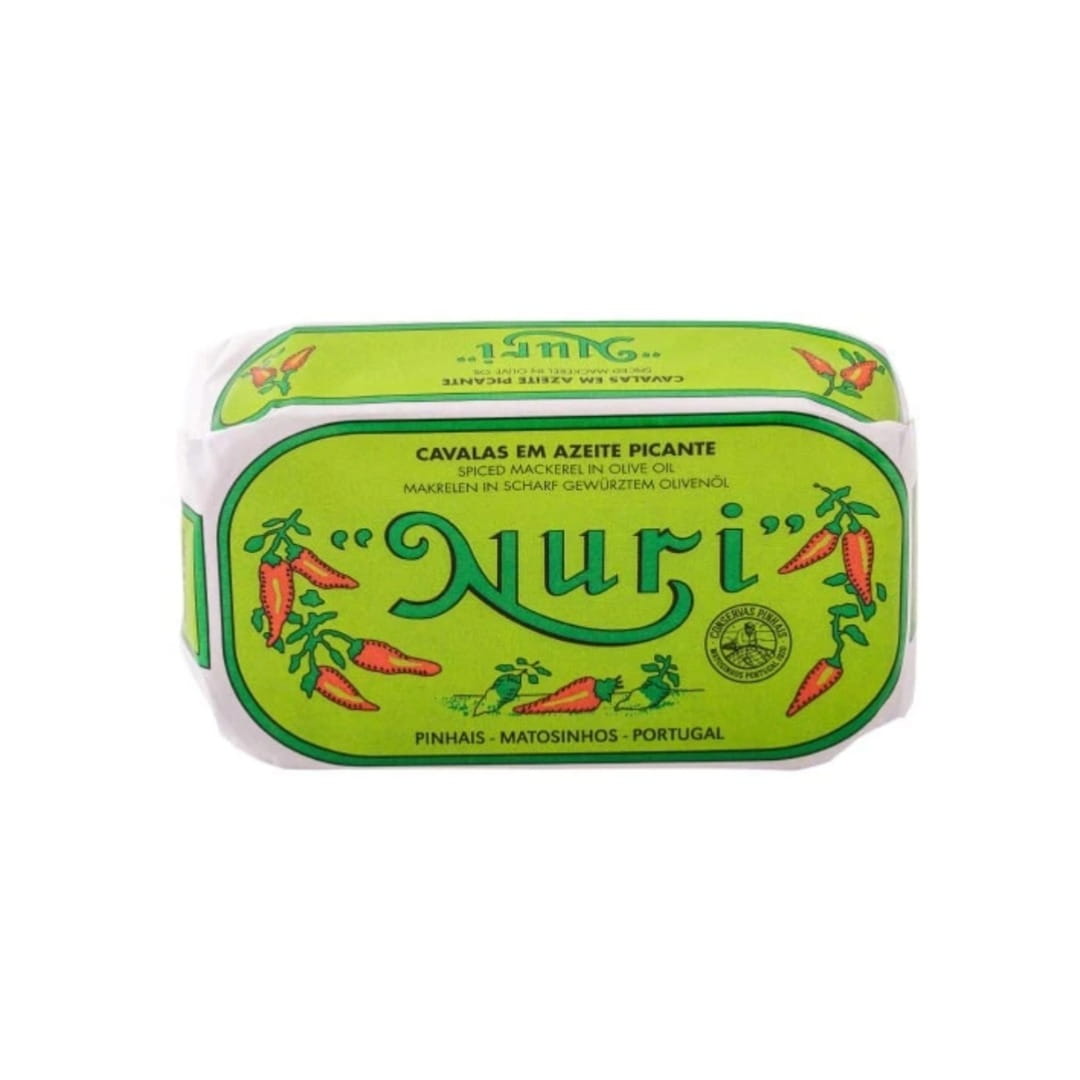 Green can of Nuri mackerel in olive oil on a white background