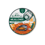 Tin of La Curiosa Mejillones with a colorful label on a white background