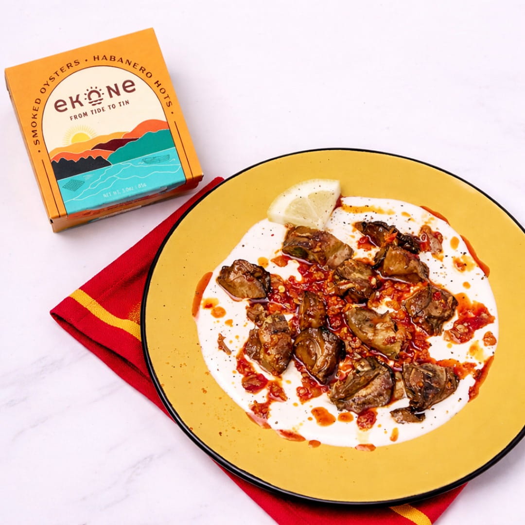 Plate of food with a box labeled 'Ekone' on a white background
