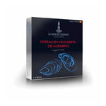 Box of La Mar de Tazones oysters with a dark background and blue text.