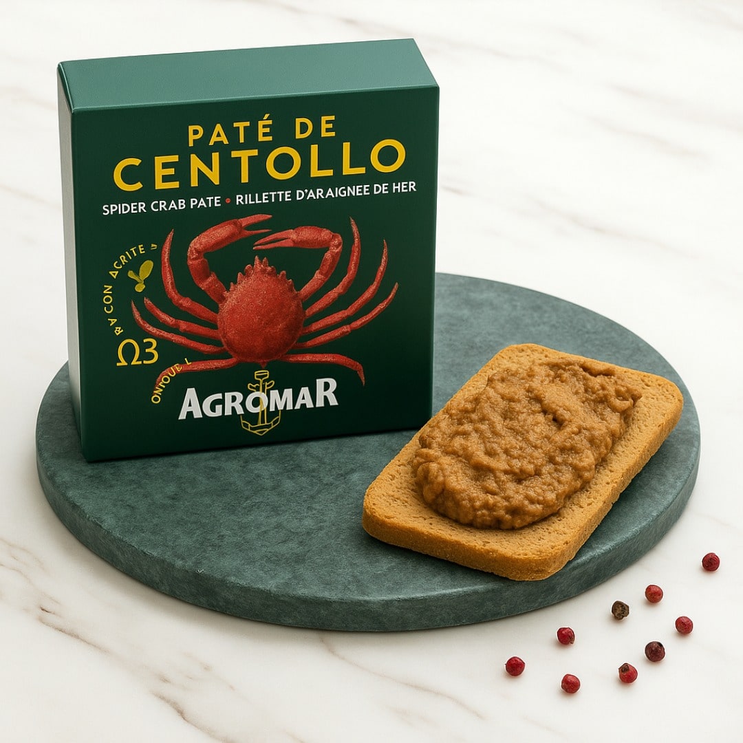 Agromar spider crab pate with a slice of bread on a green plate