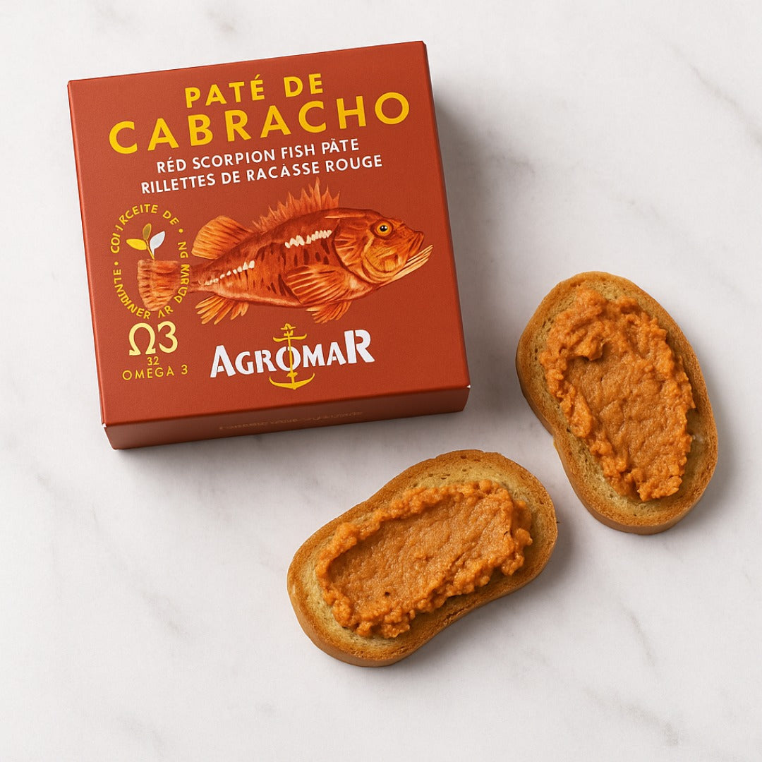 Agromar Pate de Cabracho packaging with two slices of bread spread with the pate on a white background