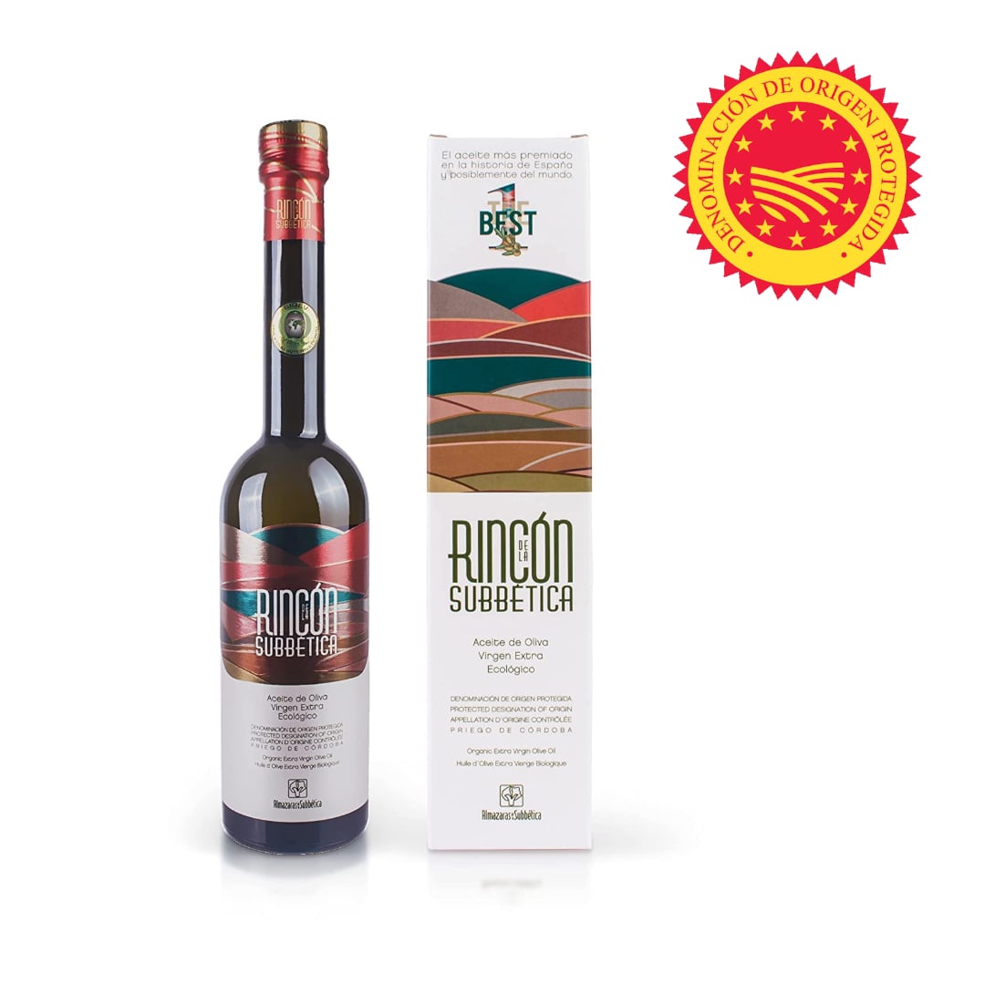 Bottle of 'Rincon Subbetica' olive oil with packaging and a quality seal on a white background