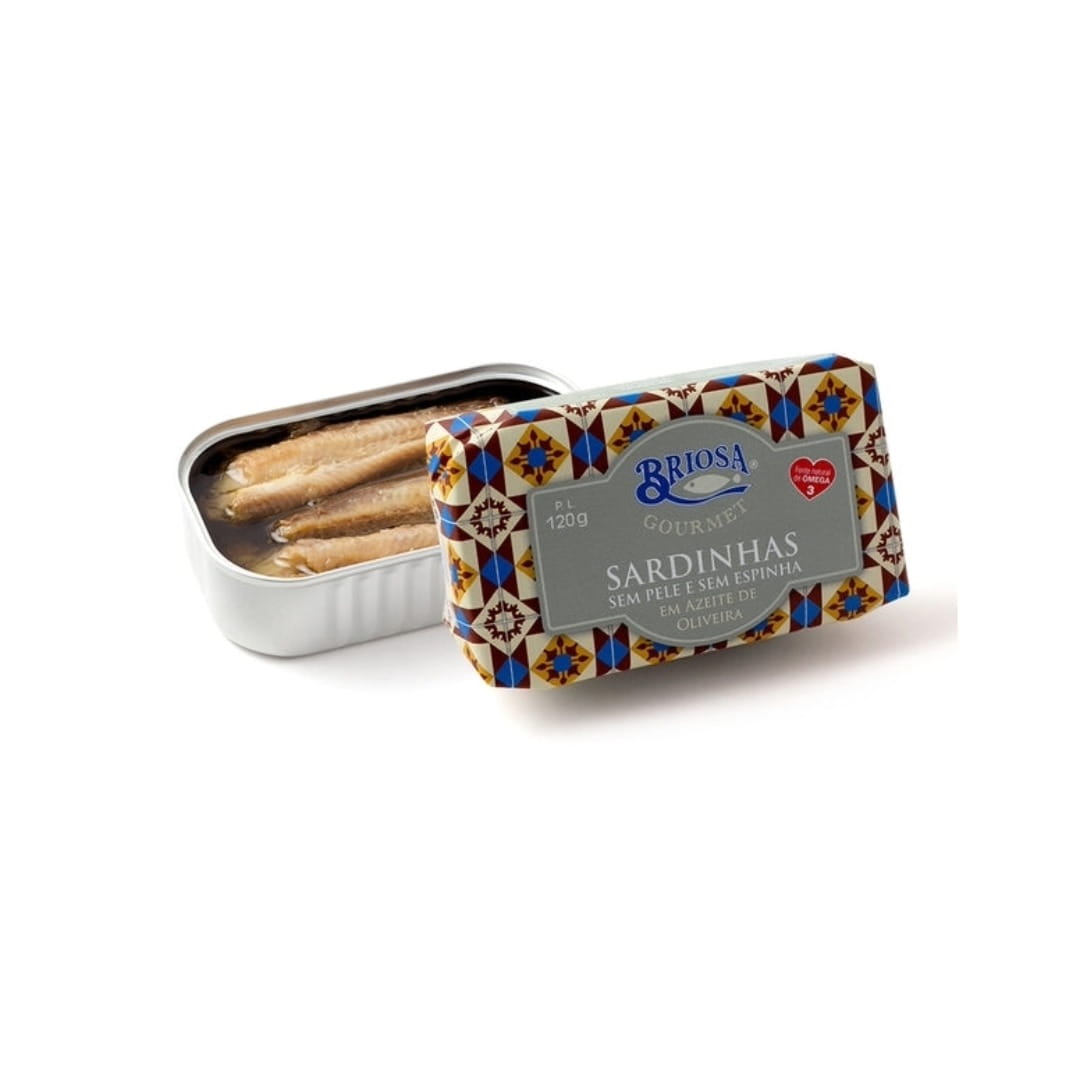 Tin of sardines with decorative lid on a white background
