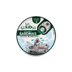 Tin of La Curiosa sardines on a white background