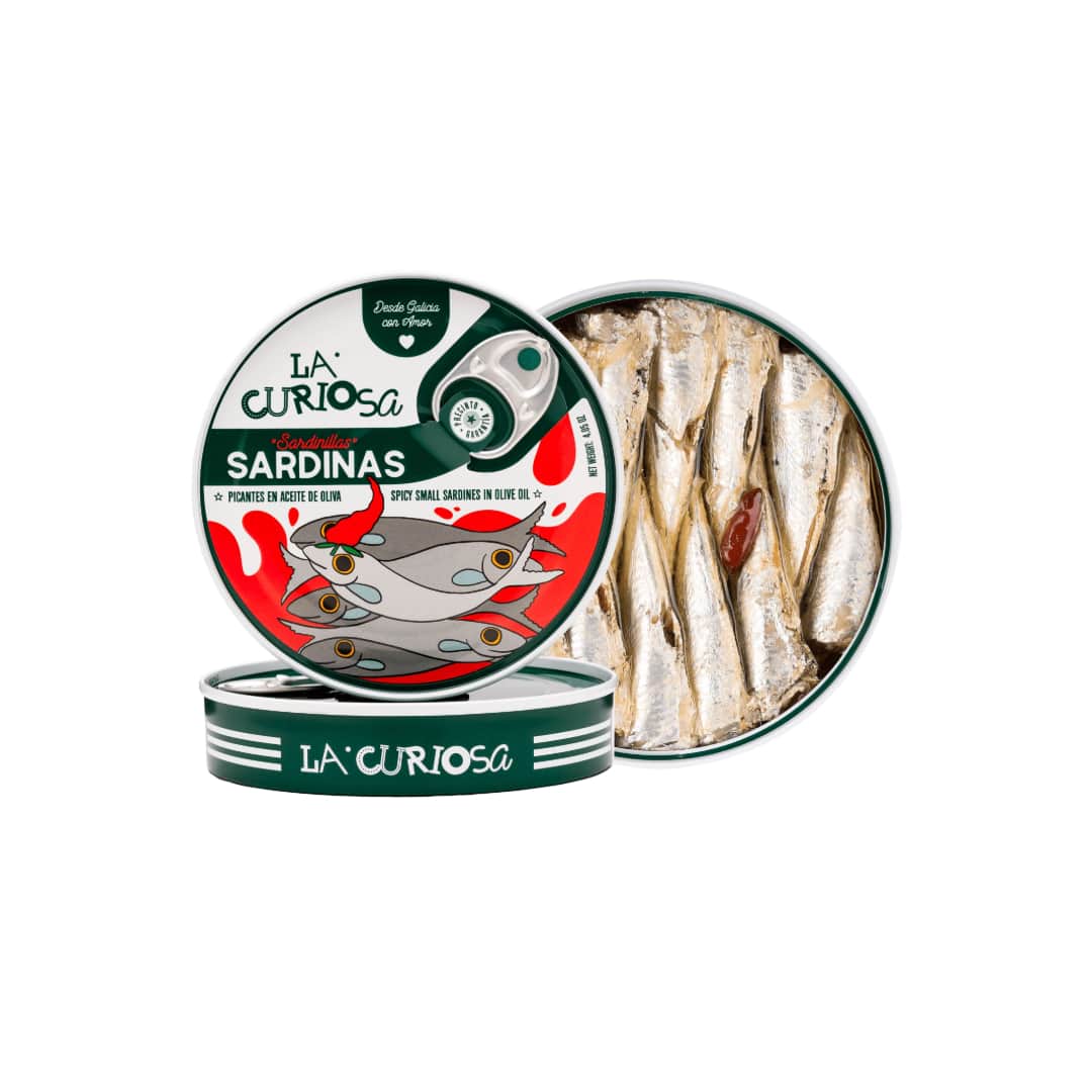 Tin of La Curiosa sardines with a clear lid showing sardines inside on a white background.