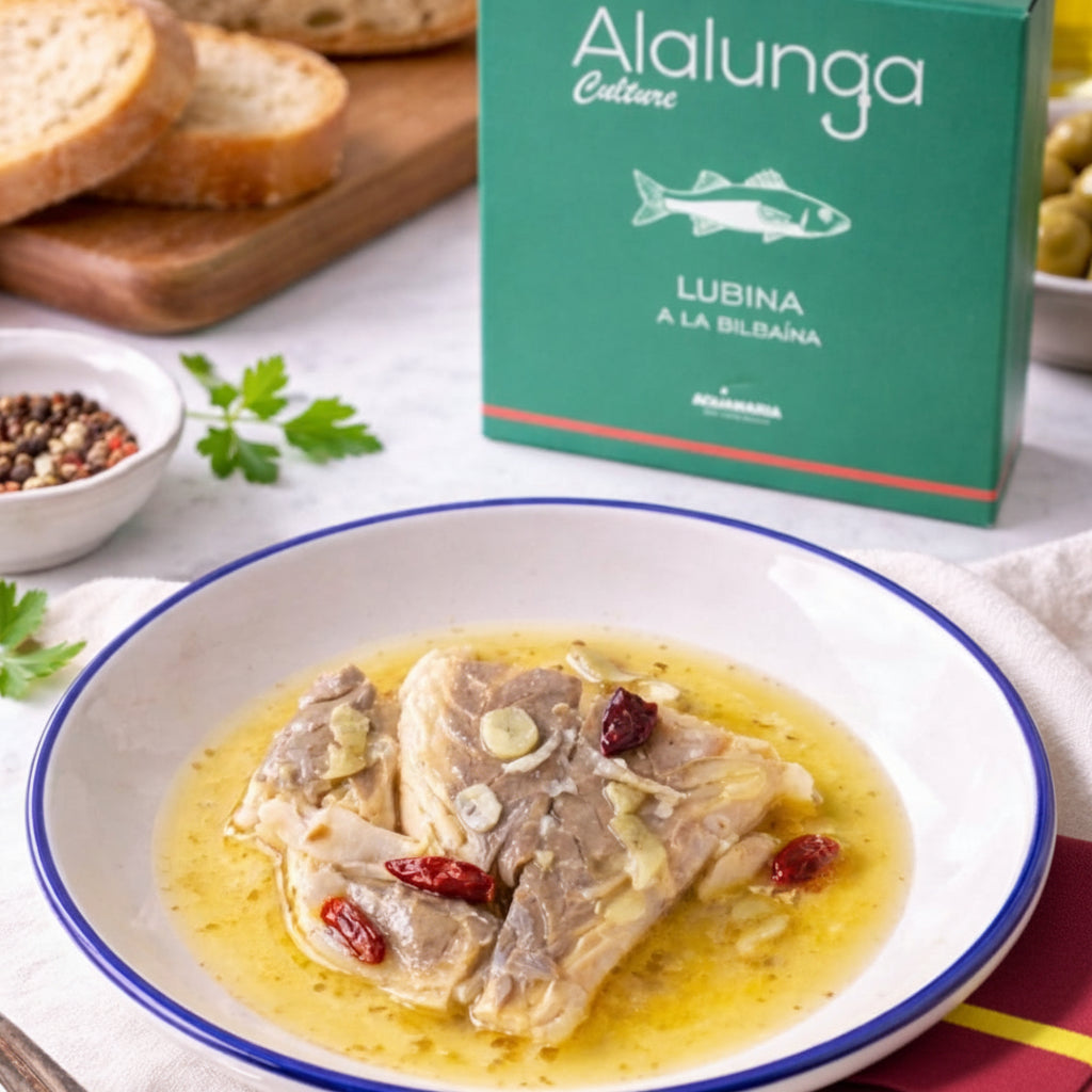 Dish of fish in a broth with 'Alalunga' packaging in the background