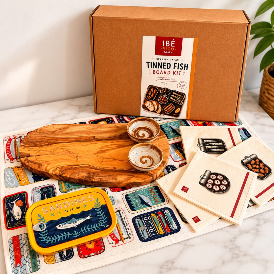 Tinned Fish Board Kit with wooden board, cards, and a box on a marble surface.