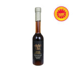 Bottle of ARVUM sherry vinegar with a gold label on a white background