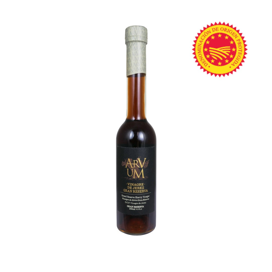 Bottle of ARVUM sherry vinegar with a gold label on a white background