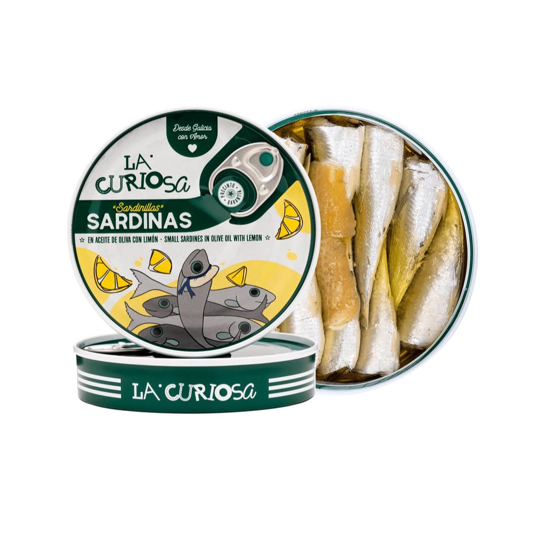 Tin of La Curiosa sardines with a clear lid showing sardines inside on a white background.