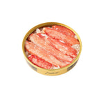 Can of snow crab legs on a white background