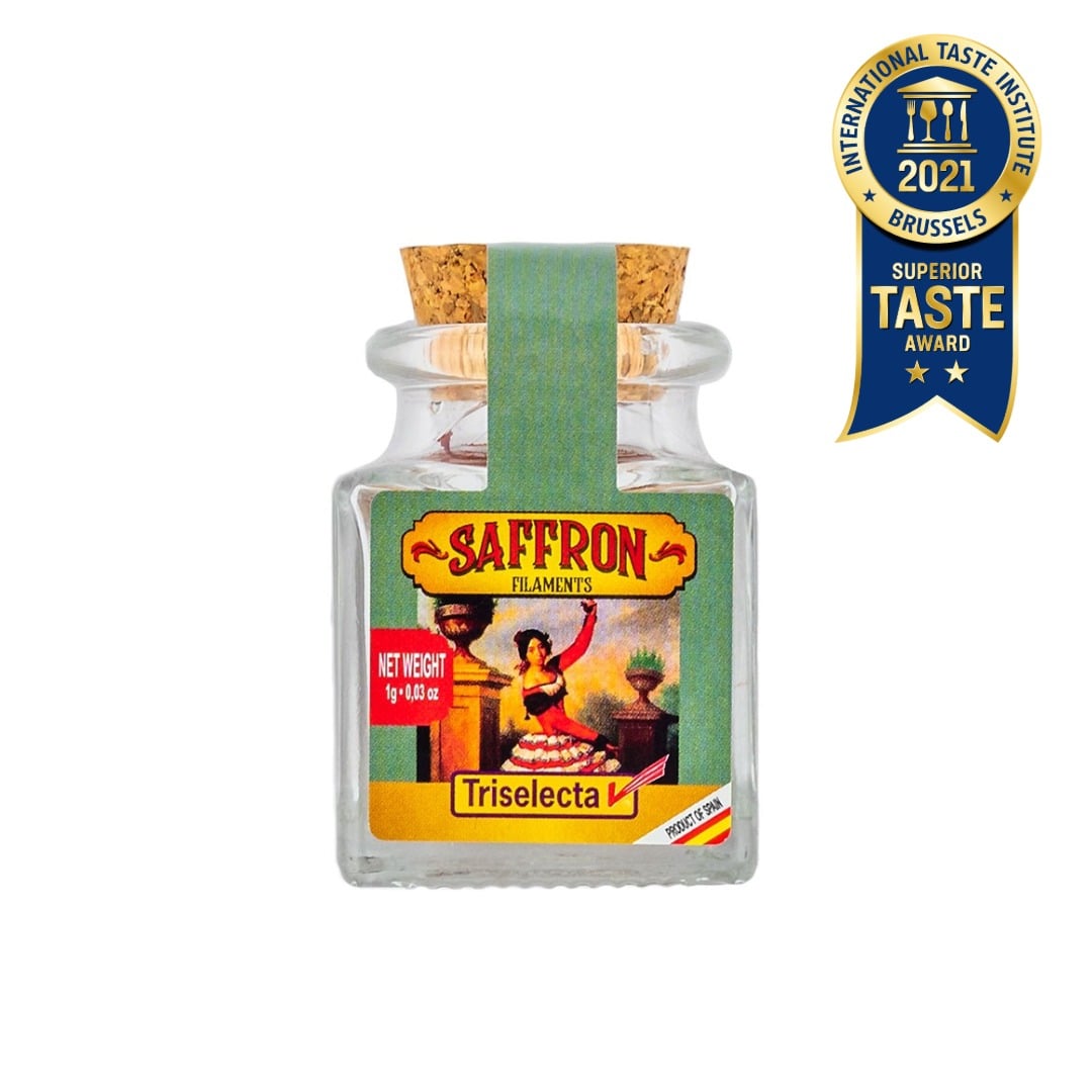 Saffron bottle with colorful label and International Taste Institute award badge on a white background