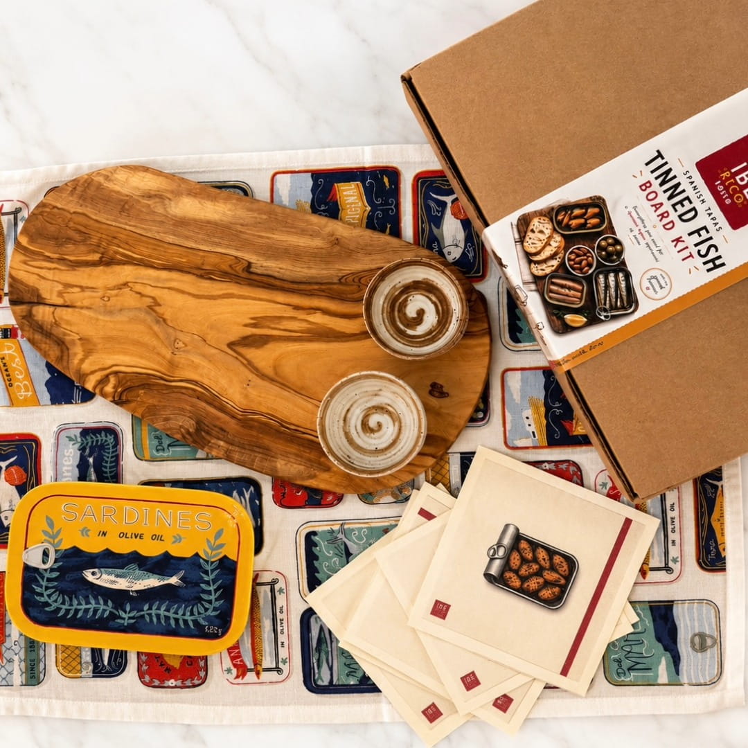 Wooden tinned fish board kit with various components on a white background